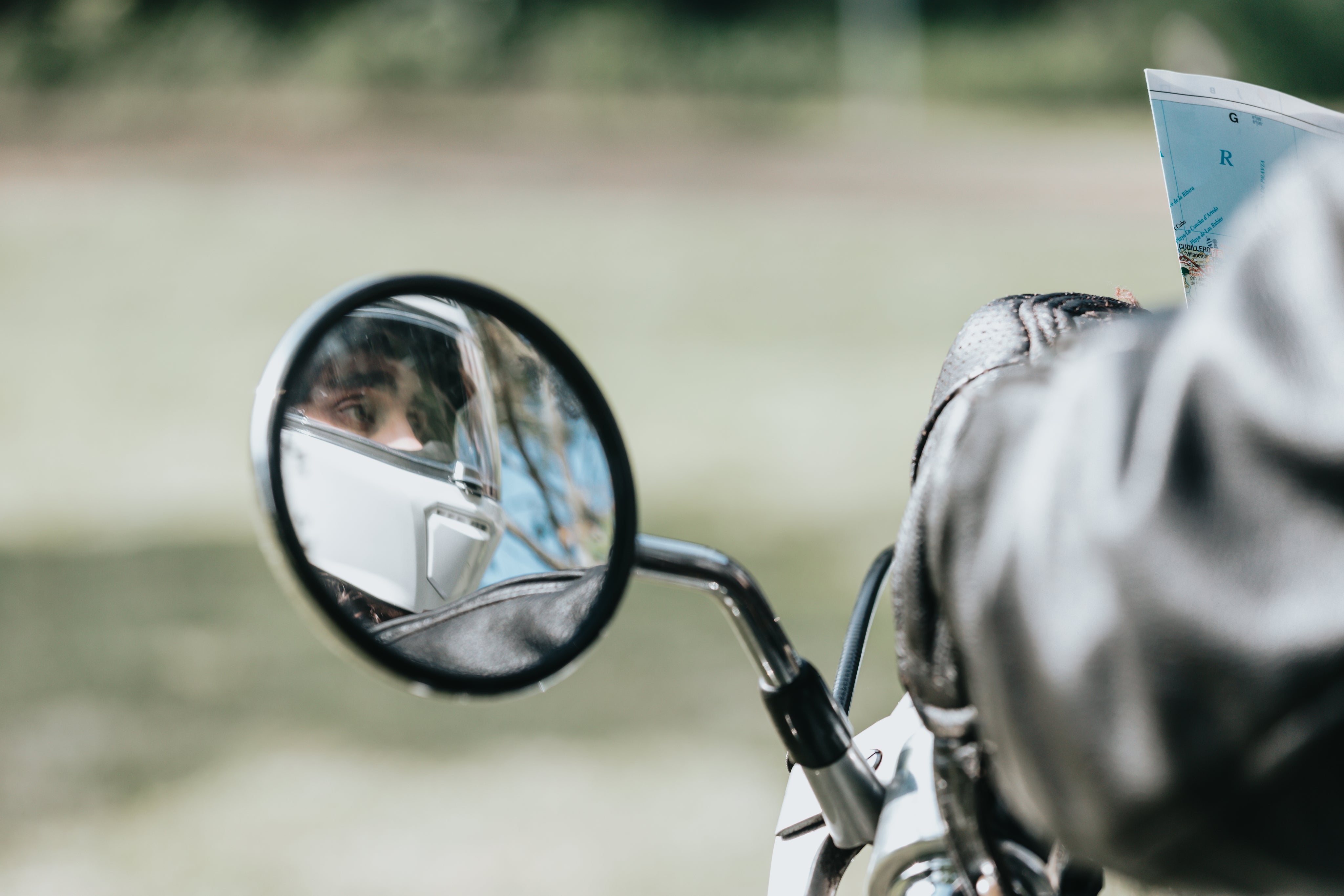 files/motorcycle-mirror-reflecting-the-riders-face.jpg